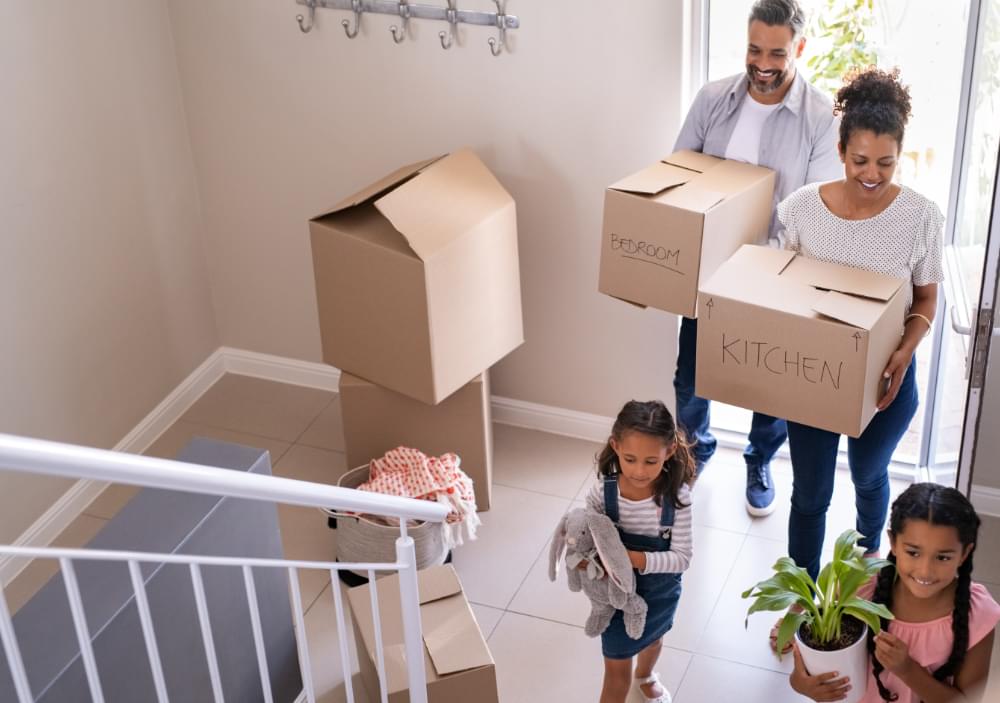 A family moving into their new home.